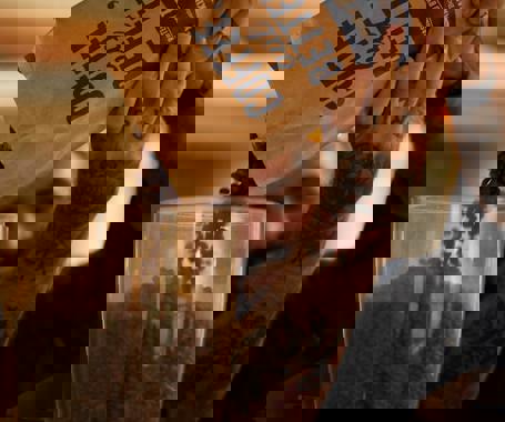 Ethically sourced coffee from Extract Coffee, made by our expert baristas. The bag has the words 'Coffee But Better' in blue written upon it